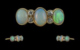 Antique Period Pleasing 18ct Gold Opal and Diamond Set Ring, raised openwork setting, marked 18ct to