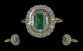 Ladies - Quality 18ct Gold Emerald and Diamond Set Dress Ring. The Central Step-cut Emerald of