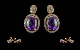 Ladies Fine Pair of 18ct Gold Diamond and Amethyst Set Earrings. Marked 750. The Central Amethysts