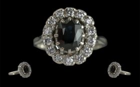 Ladies 18c14t White Gold Blue Sapphire and Diamond Set Dress Ring, flower head setting, full