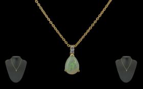 Ladies Attractive 18ct Yellow Gold Opal and Diamond Set Pendant with attached 18ct gold chain,