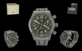 Omega Dynamic Gents Steel Automatic Chronograph Wrist Watch, Ref.no. 9EZ020, features black dial,