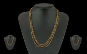 Victorian Period Pleasing Quality Ladies 9ct Gold Belcher Chain of long length, marked 9ct,
