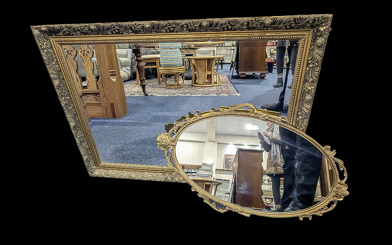 Two Decorative Mirrors, comprising a large over mantle mirror with bevelled edges,