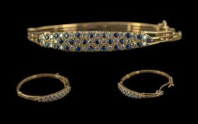 Ladies 14ct Gold Diamond and Sapphire Set Hinged Bangle with Safety Chain, Pleasing Design.