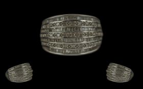 9ct Gold Diamond & Baguette Seven Row Ring, weight 4.50, ring size N.