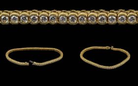 Ladies 18ct Yellow Gold Well Made Quality Diamond Set Line Bracelet, marked 750 18ct, the well