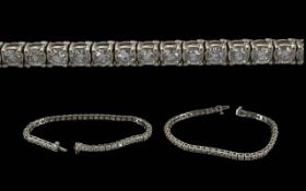 Ladies Superb Quality 14ct White Gold Diamond Set Line Bracelet, marked 14ct, the well matched,