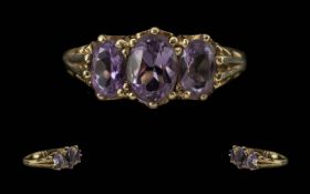 Ladies - Pleasing 9ct Gold 3 Stone Amethyst Set Ring, Raised Setting ( Ornate ) The 3 Well Matched