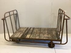 A railway porter's trolley marked Bardsley's of Colchester, width 190cm, depth 84cm, height 108cm