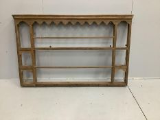 A 19th century pine plate rack, width 159cm, height 100cm