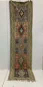 A Kilim polychrome flatweave runner, 280 x 78cm