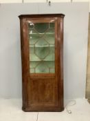 A George III mahogany standing corner cupboard, width 93cm, depth 50cm, height 198cm