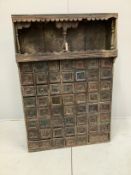 An Indian painted hardwood bank of drawers (af), width 96cm, depth 31cm, height 141cm