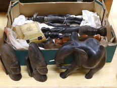 A collection of African tribal carvings, a box etc