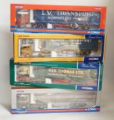 Four boxed Corgi 1:50 scale articulated trucks; a DAF XF Space Cab Curtainside lorry (CC13227), a