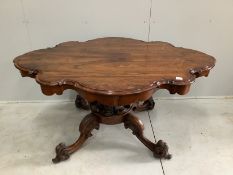 A mid Victorian rosewood centre table of shaped oval form, width 160cm, depth 108cm, height 76cm