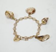 A modern 9ct gold charm bracelet hung with four shell charms, gross weight 19.1 grams.