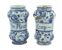 A pair of Italian blue and white maiolica albarellos, Savona, late 17th century, the first painted
