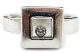 A modern Chopard 18ct white gold 'Happy Floating' diamond ring, makers mark GA, size K, gross weight