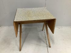 A mid century oak and melamine drop flap dining table, width 70cm, depth 68cm, height 73cm
