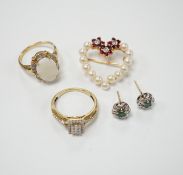 Two yellow metal and gem set rings, including diamond chip cluster and white opal and diamond chip