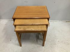 A mid century rectangular teak nest of three tables, width 55cm, depth 40cm, height 46cm