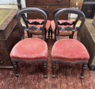 A set of six Victorian balloon back dining chairs