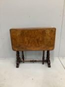 A late Victorian figured walnut Sutherland table, width 76cm, height 72cm