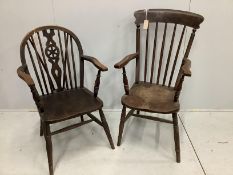 A Victorian elm and beech Windsor comb back armchair, height 107cm together with a later wheel