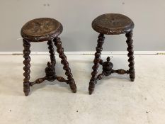 A pair of late Victorian carved and turned oak stools, height 48cm