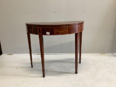 An Edwardian Sheraton Revival inlaid mahogany and marquetry D shaped card table, width 89cm, depth