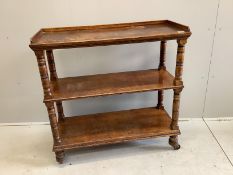 A late Victorian oak three tier buffet, width 99cm, depth 40cm, height 100cm