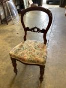 A harlequin set of six Victorian mahogany balloon back dining chairs