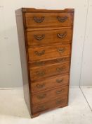 A reproduction 'Starbay' eight drawer narrow secretaire chest, width 55cm, depth 40cm, height 126cm