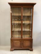 An Edwardian mahogany display cabinet, width 106cm, depth 39cm, height 203cm
