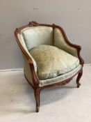 A Louis XVI style carved walnut small bergere chair, width 63cm, depth 53cm, height 76cm