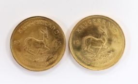 Gold coins, South Africa, two gold 1oz. Krugerrands, 1975, near UNC (2oz.)