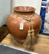 A large glazed earthenware urn, height 54cm