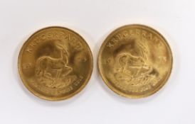 Gold coins, South Africa, two gold 1oz. Krugerrands, 1975, near UNC (2oz.)