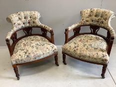 A pair of late Victorian mahogany upholstered tub framed salon chairs, width 61cm, depth 61cm,