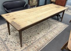A 19th century French rectangular oak and fruitwood two drawer kitchen table, width 281cm, depth