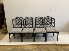 A set of eight reproduction ebonised faux bamboo dining chairs