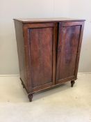 A Regency mahogany two door side cabinet, width 74cm, depth 41cm, height 95cm