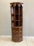 A Spanish walnut corner cupboard, width 59cm, depth 40cm, height 179cm