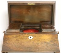 A Victorian rosewood sarcophagus shaped tea caddy with mother of pearl escutcheon, 33.5cm wide