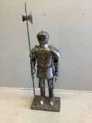 A metal miniature suit of armour, height 140cm