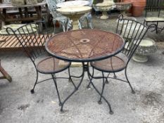A wrought iron circular garden table, diameter 78cm, height 71cm together with a pair of matching