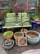 Seven assorted stone and earthenware garden planters, largest diameter 52cm, height 30cm, together