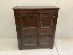 A late 17th century oak two door cupboard, width 106cm, depth 48cm, height 118cm***CONDITION